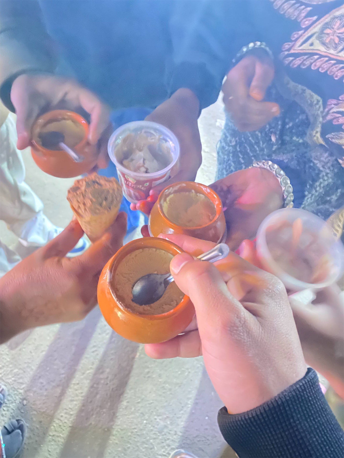 Group enjoying Indian desserts