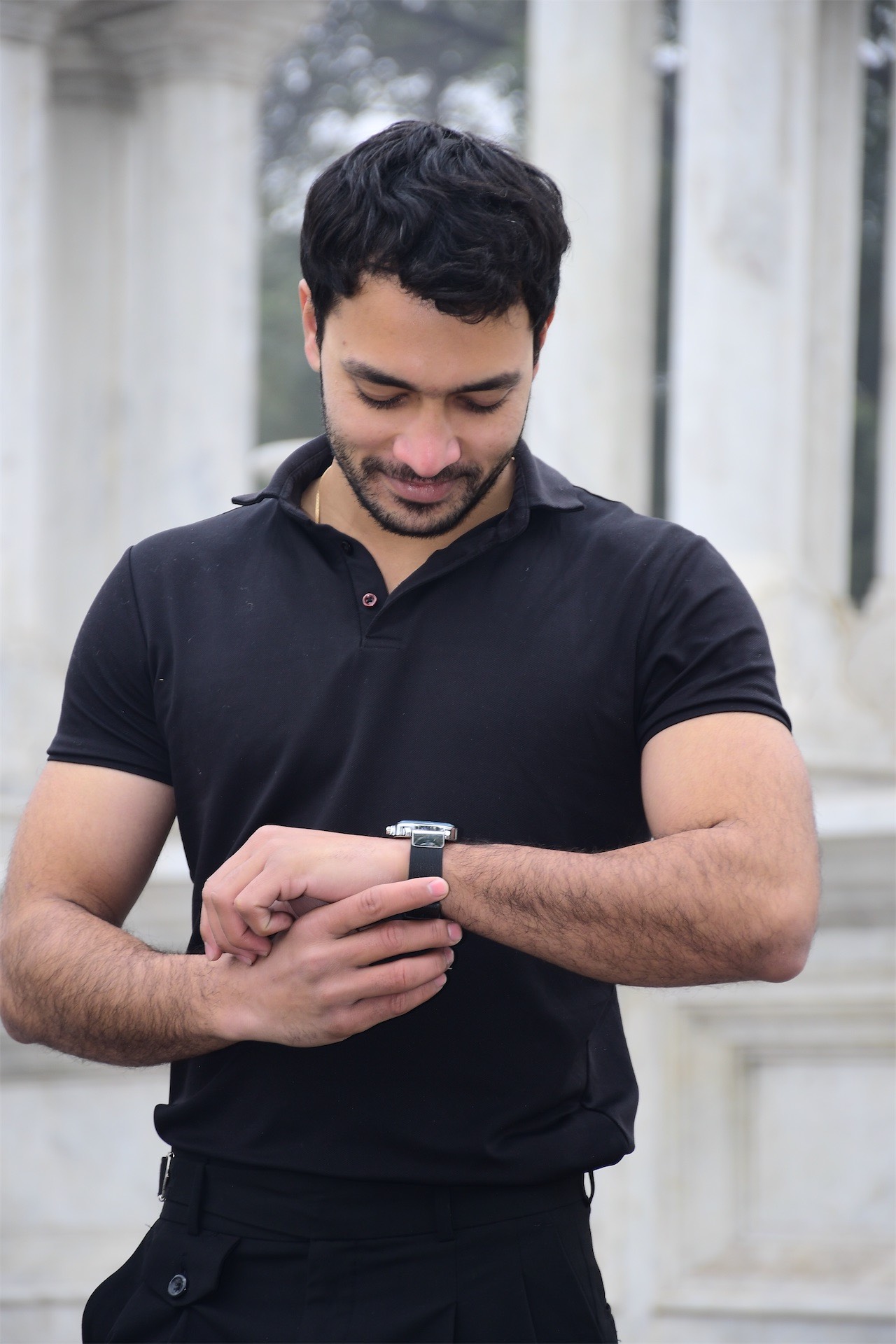 Man checking smartwatch